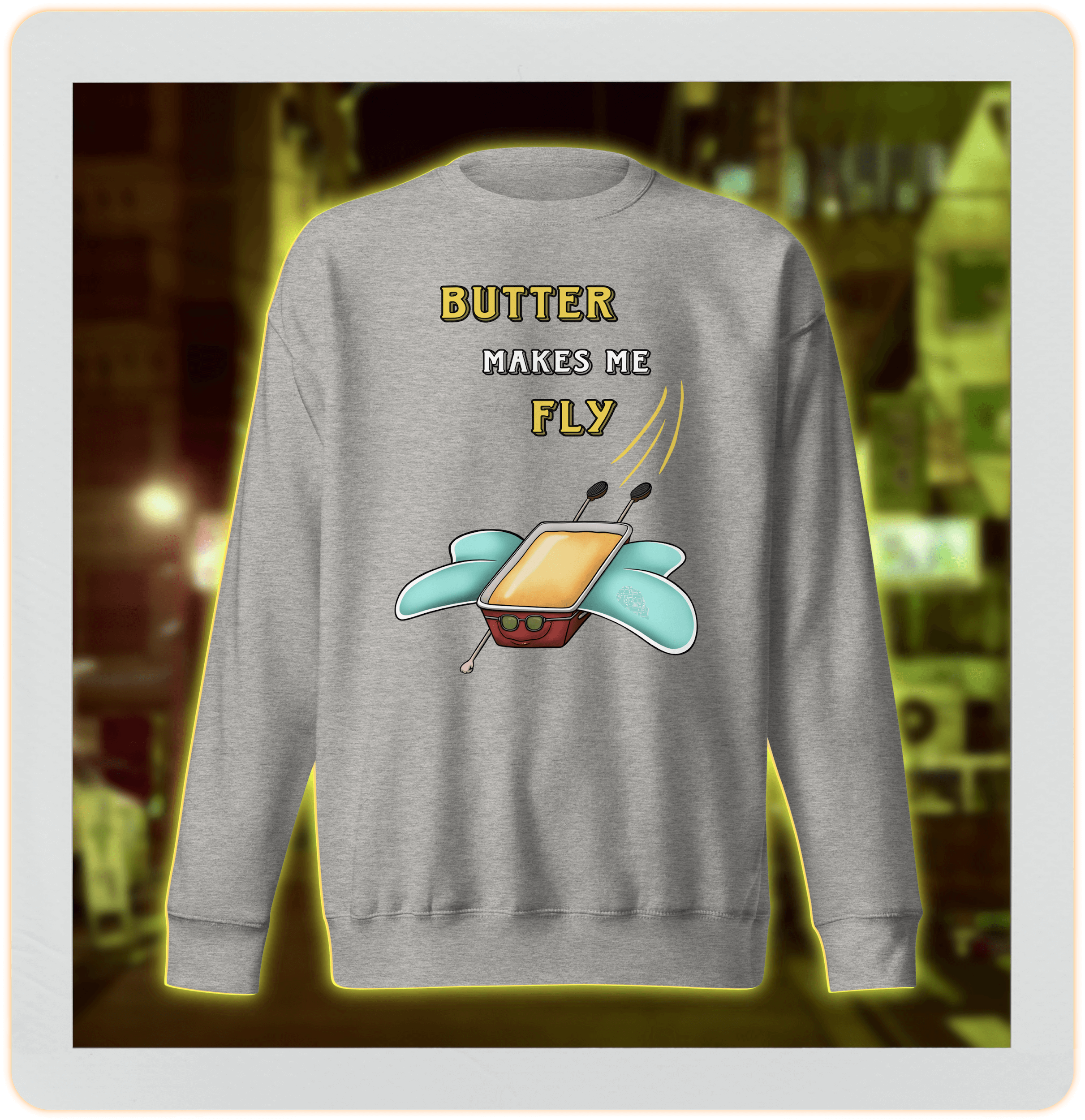 cartoon drawing of butter with wings on grey sweatshirt