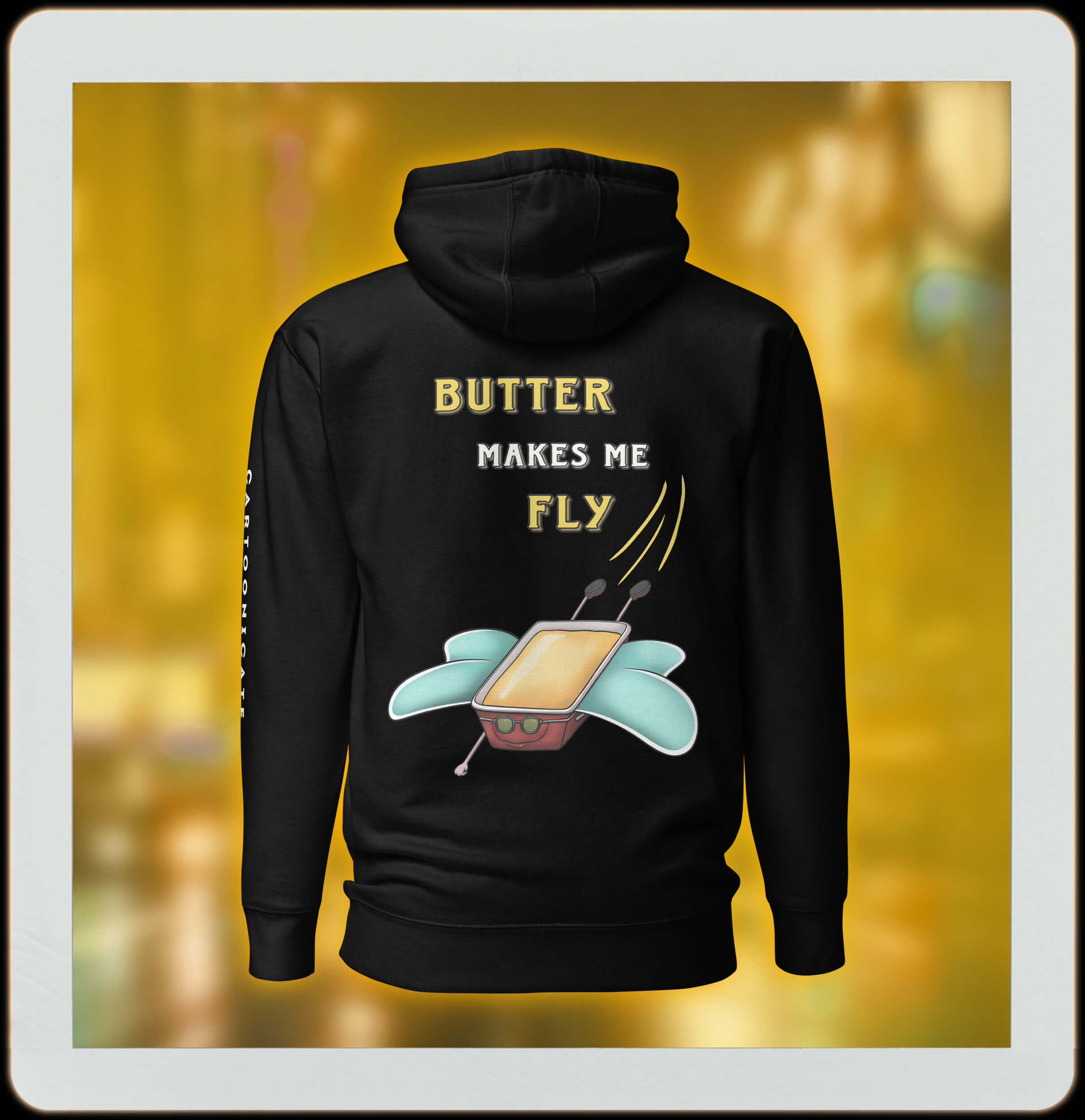 cartoon drawing of butter with wings on black hoodie