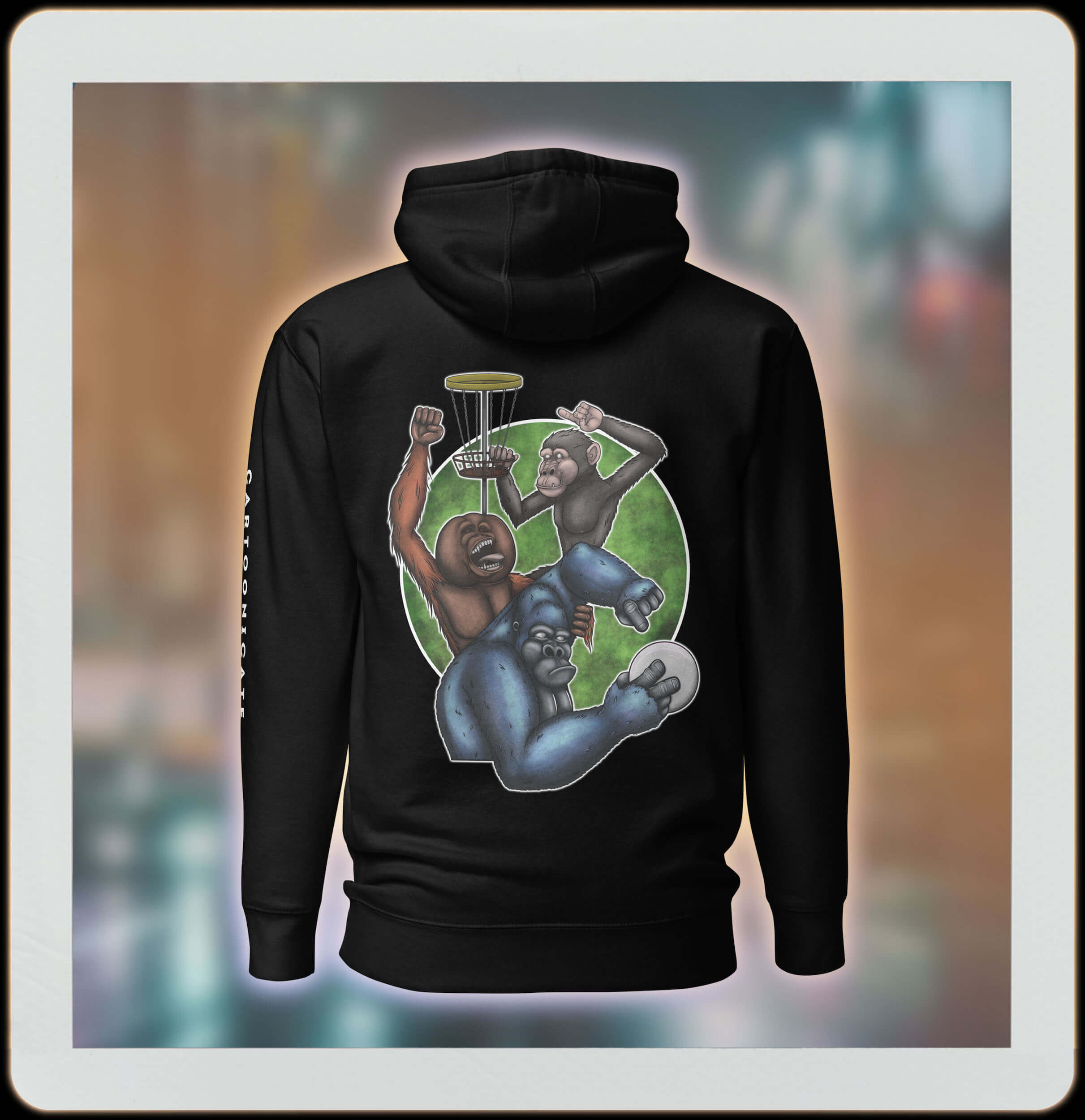 black hoodie with cartoon monkeys playing frisbee golf