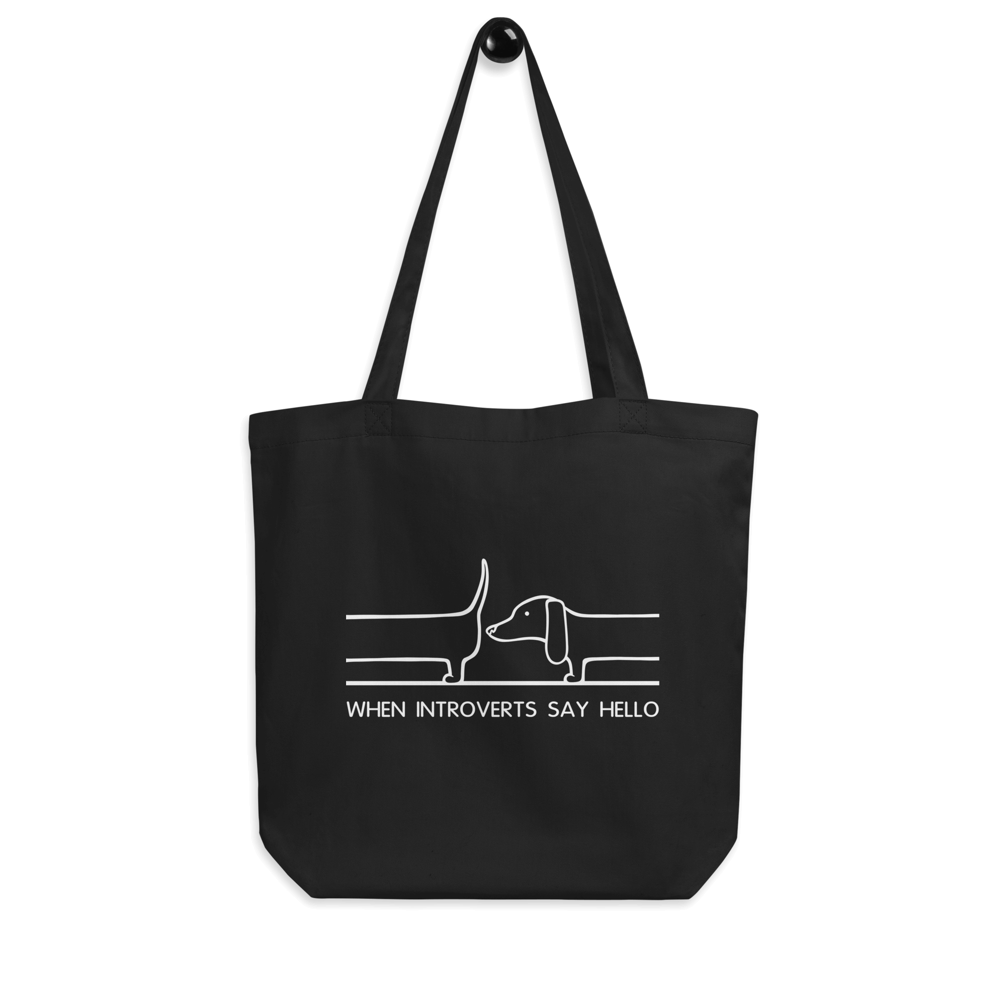 black tote bag with cartoon dachshund saying hello