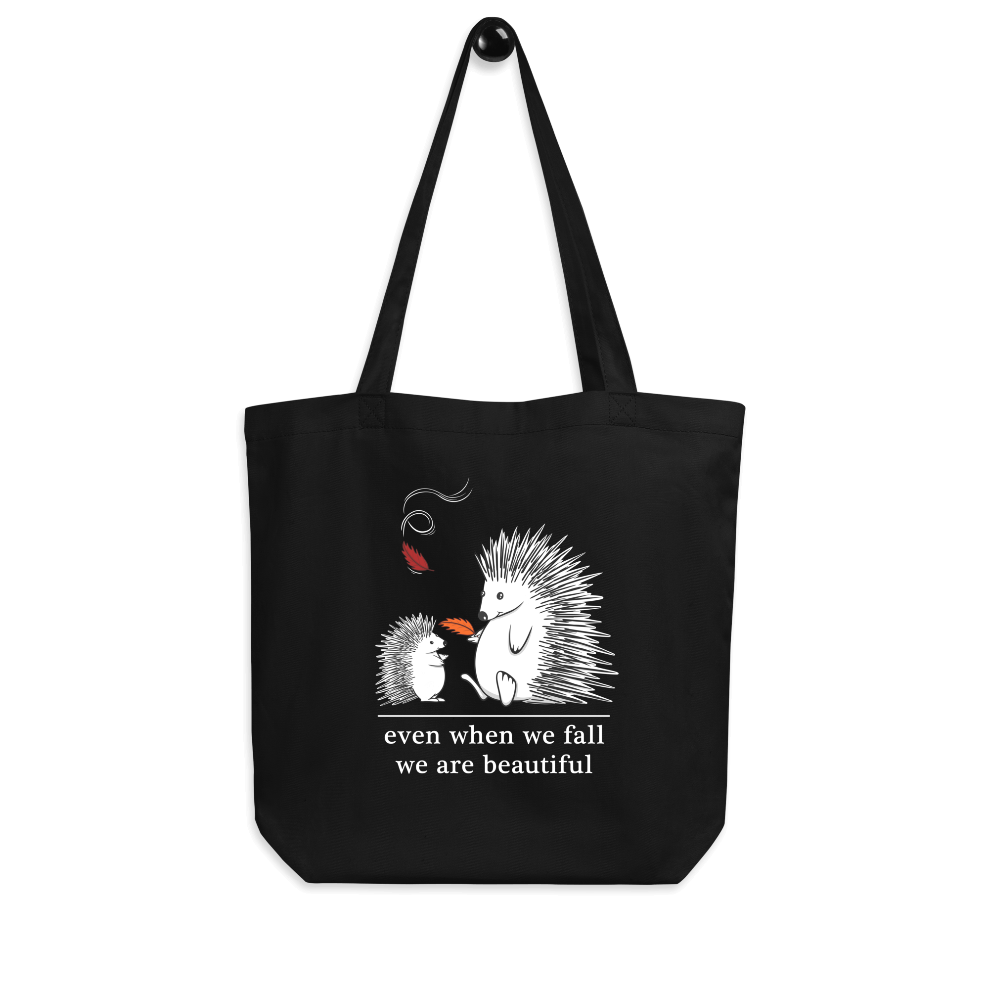 Cartoon drawing of two hedgehogs in autumn on tote bag black