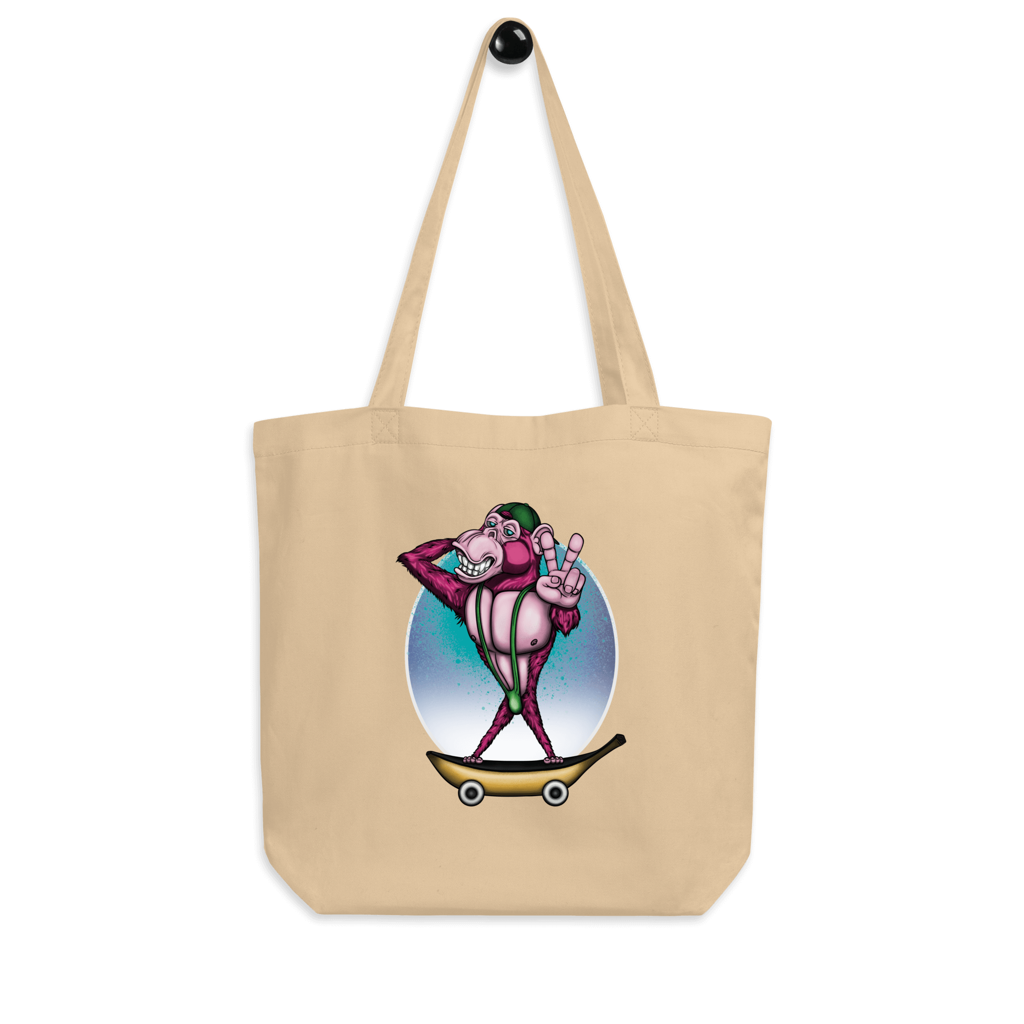 tote bag with a pink monkey on skateboard