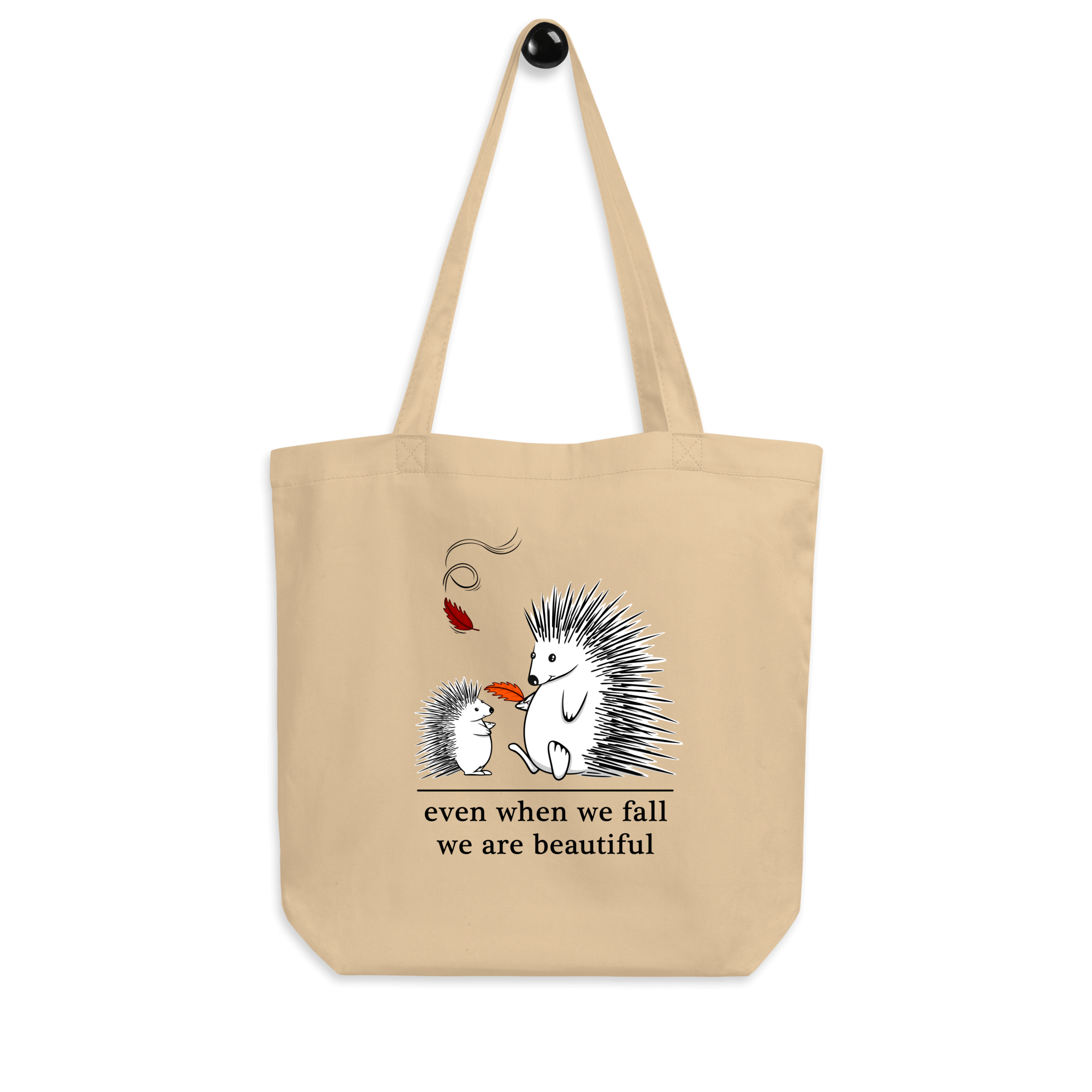 Cartoon drawing of two hedgehogs in autumn on tote bag natural