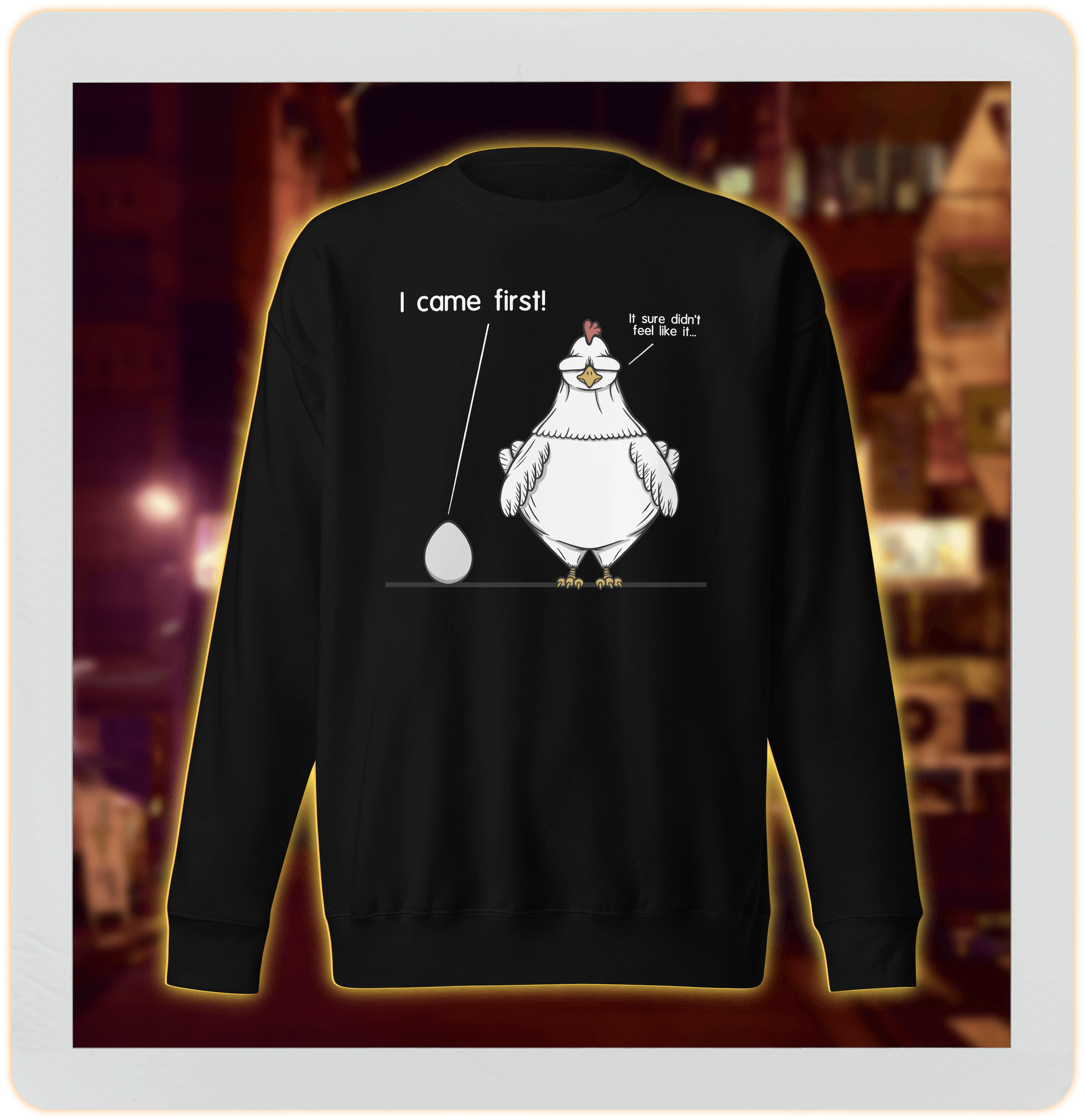 Black sweatshirt with cartoon chicken and egg