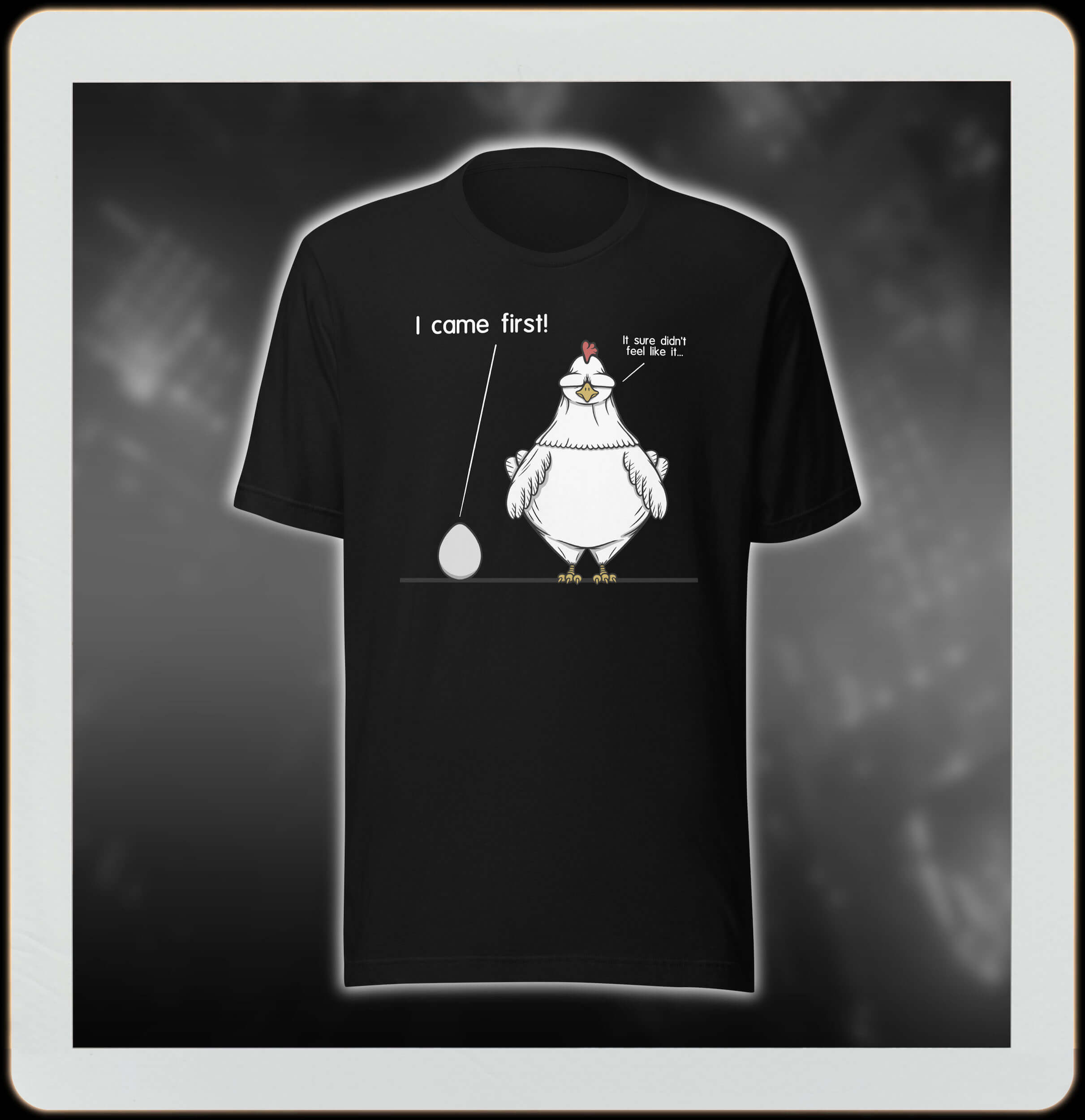 Black t-shirt with cartoon chicken and egg