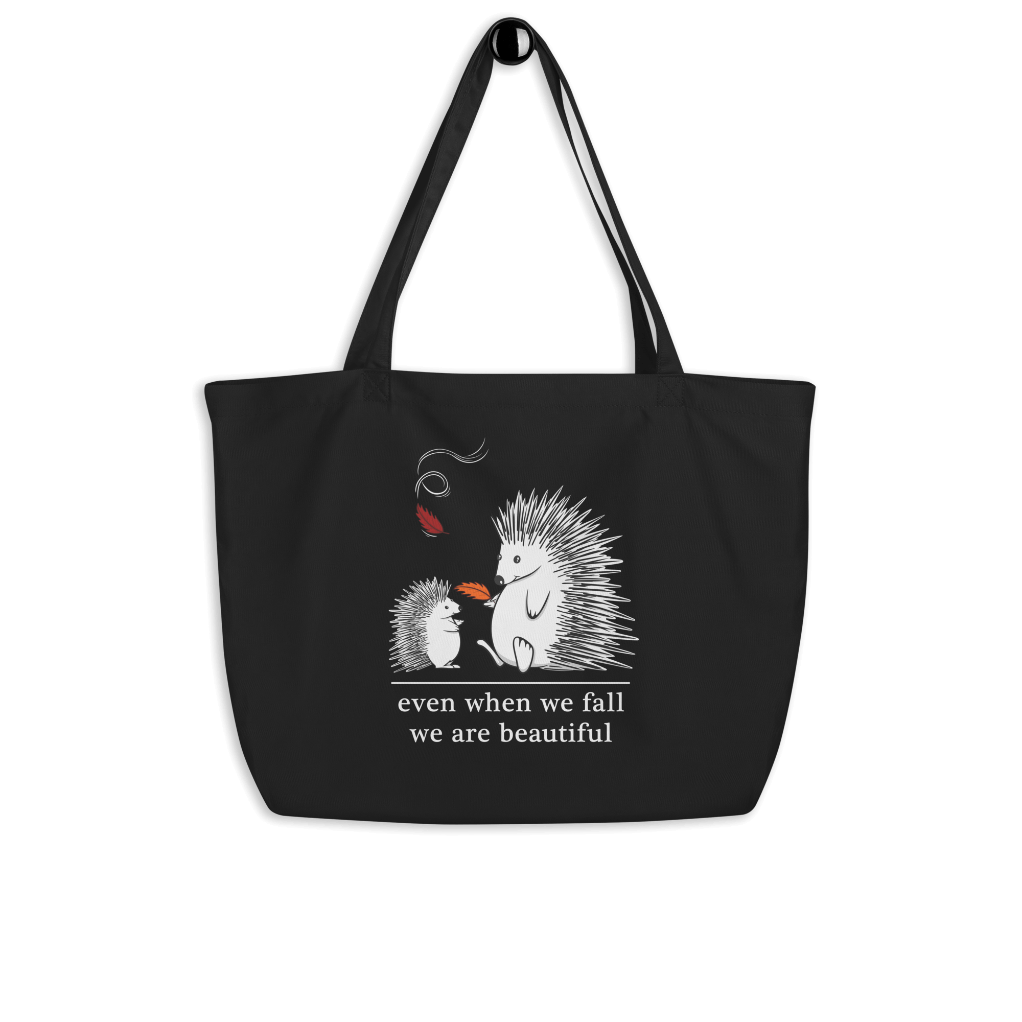 Cartoon drawing of two hedgehogs in autumn on tote bag black