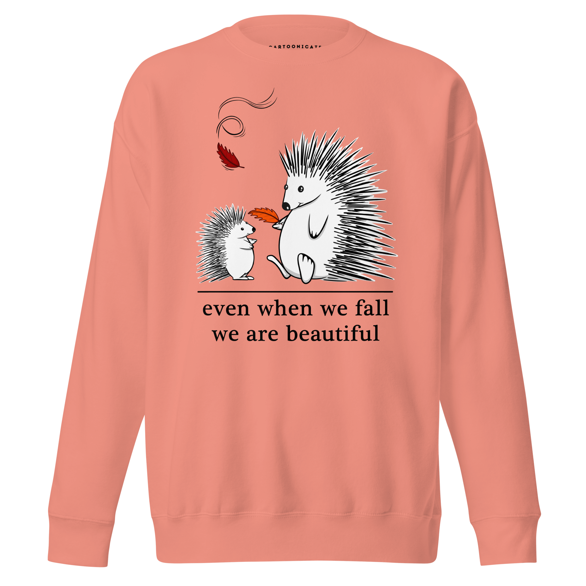 Cartoon drawing of two hedgehogs in autumn on pink sweater